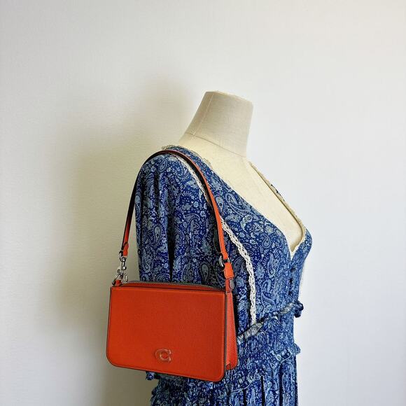 Coach CJ797 Pouch Bag With Signature Canvas IN ORANGE